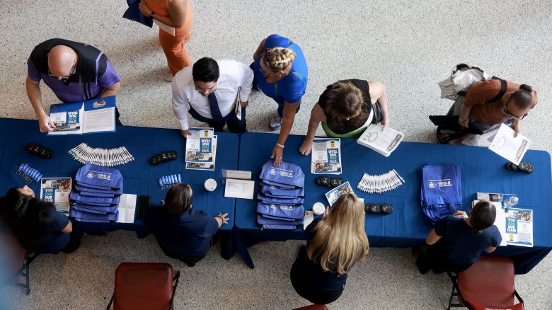 Job seekers attend a job fair on June 26 in Sunrise, Florida.